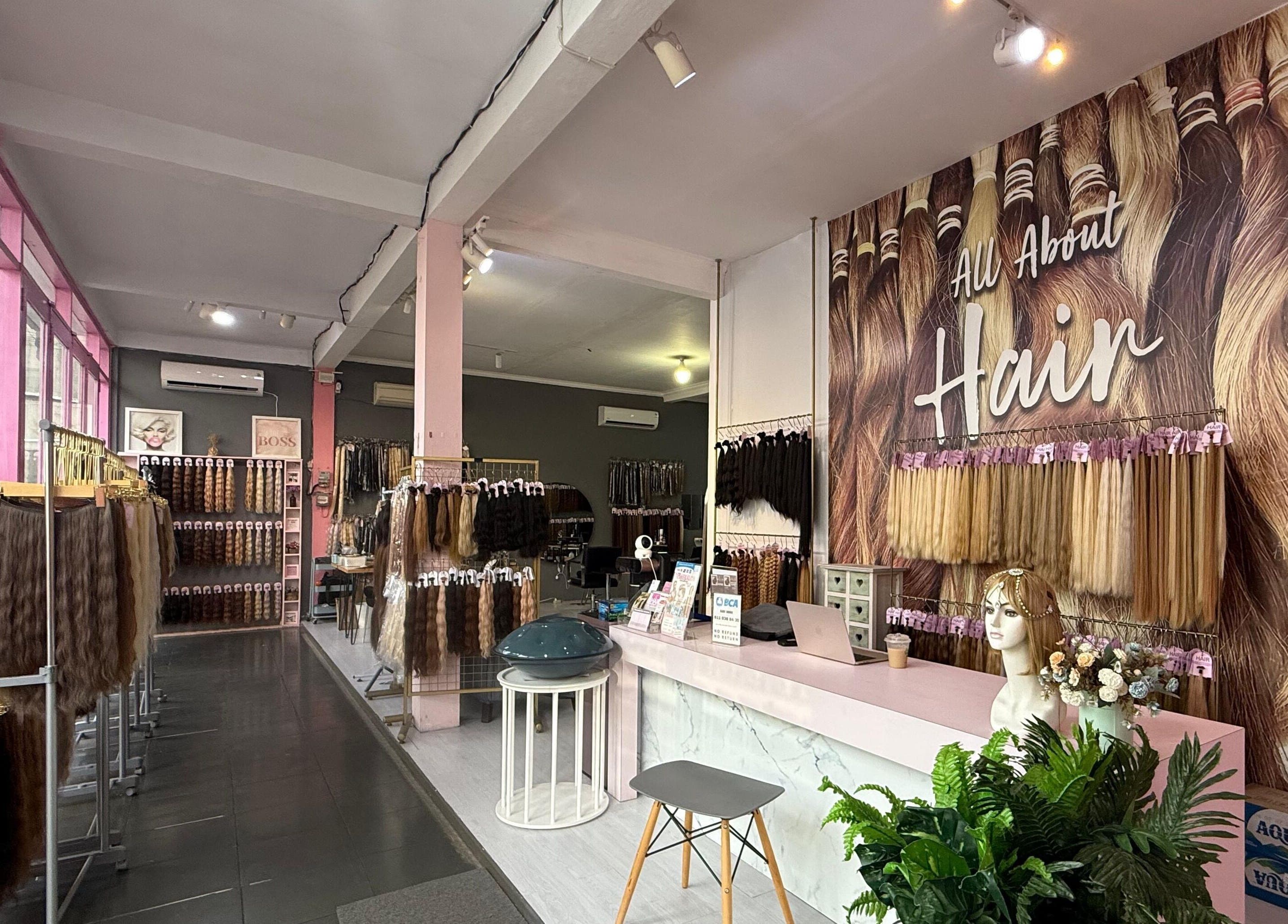Inside view of The Hair in Bali, Bali, ID, showcasing elegant hair extensions and stylish decor.