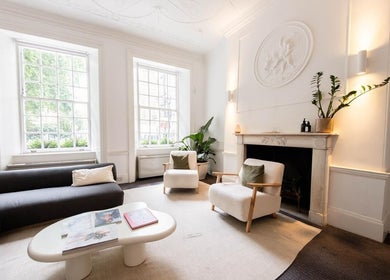 Serene lounge at The Flow Clinic, London, England, GB with modern decor and natural light.