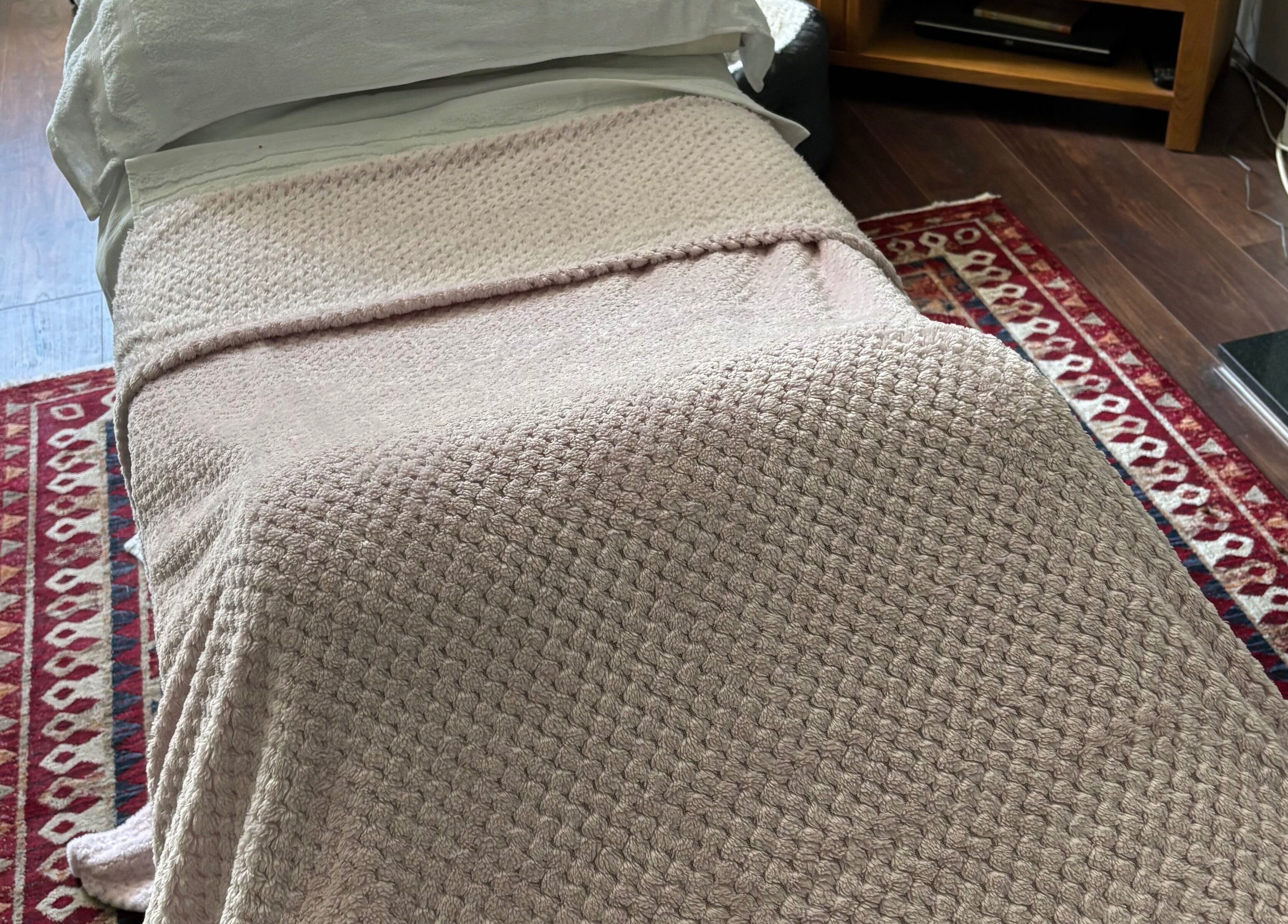 Relaxing massage bed at Sapphire Soul Alchemy in GB, offering serene calmness and wellness experiences.