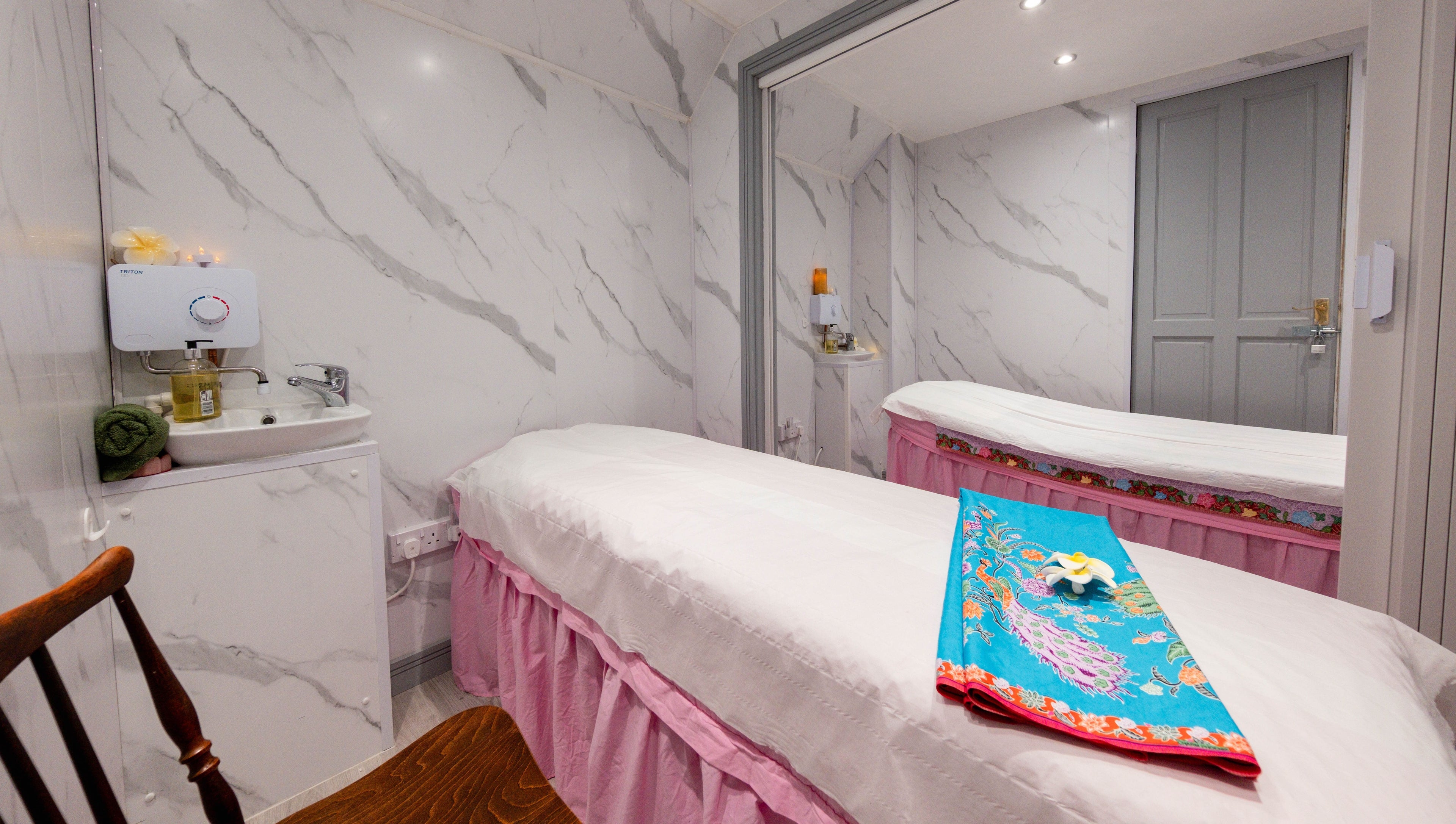 Tranquil massage room at Paanthong Thai Spa, London, England, GB with a calming ambiance.