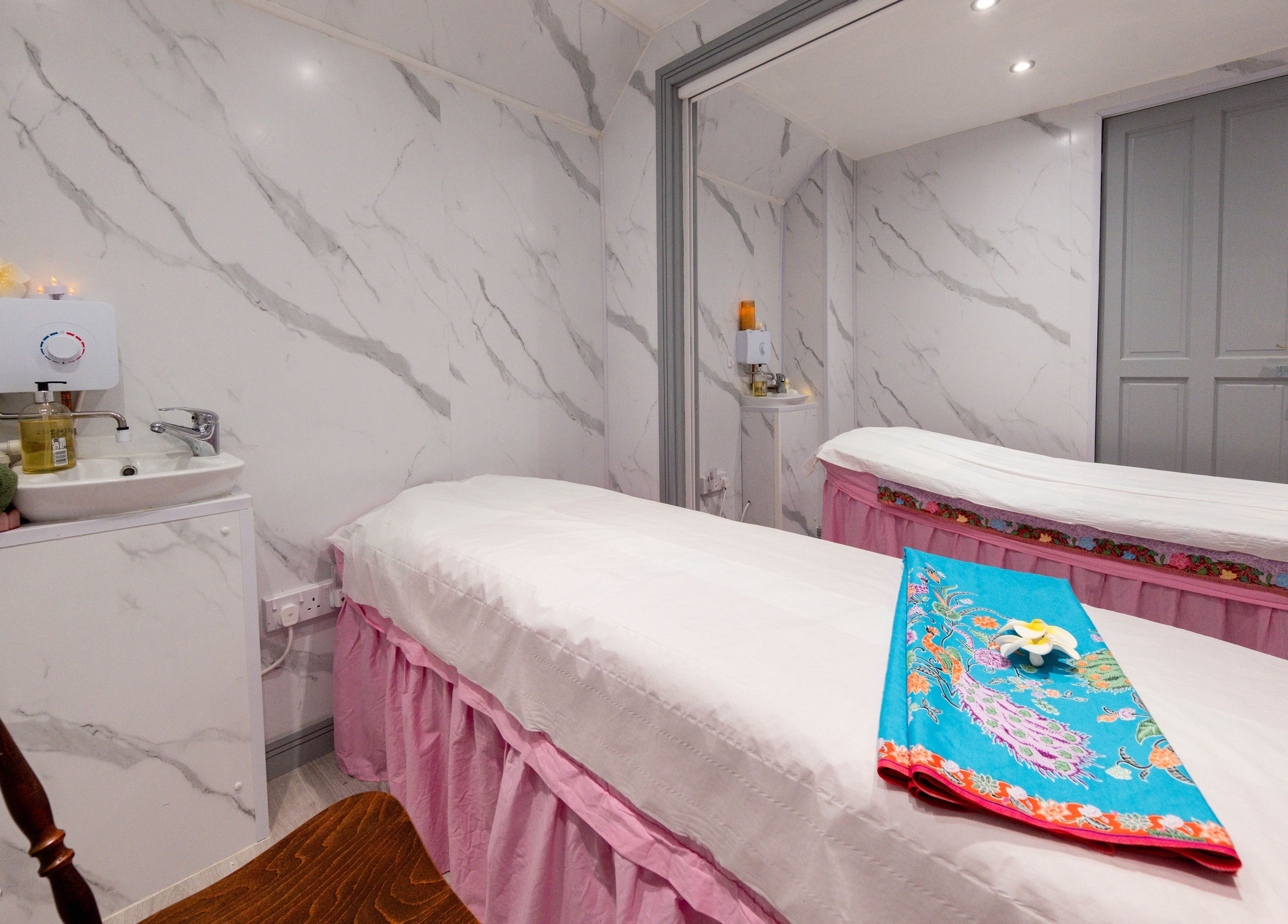 Tranquil massage room at Paanthong Thai Spa, London, England, GB with a calming ambiance.