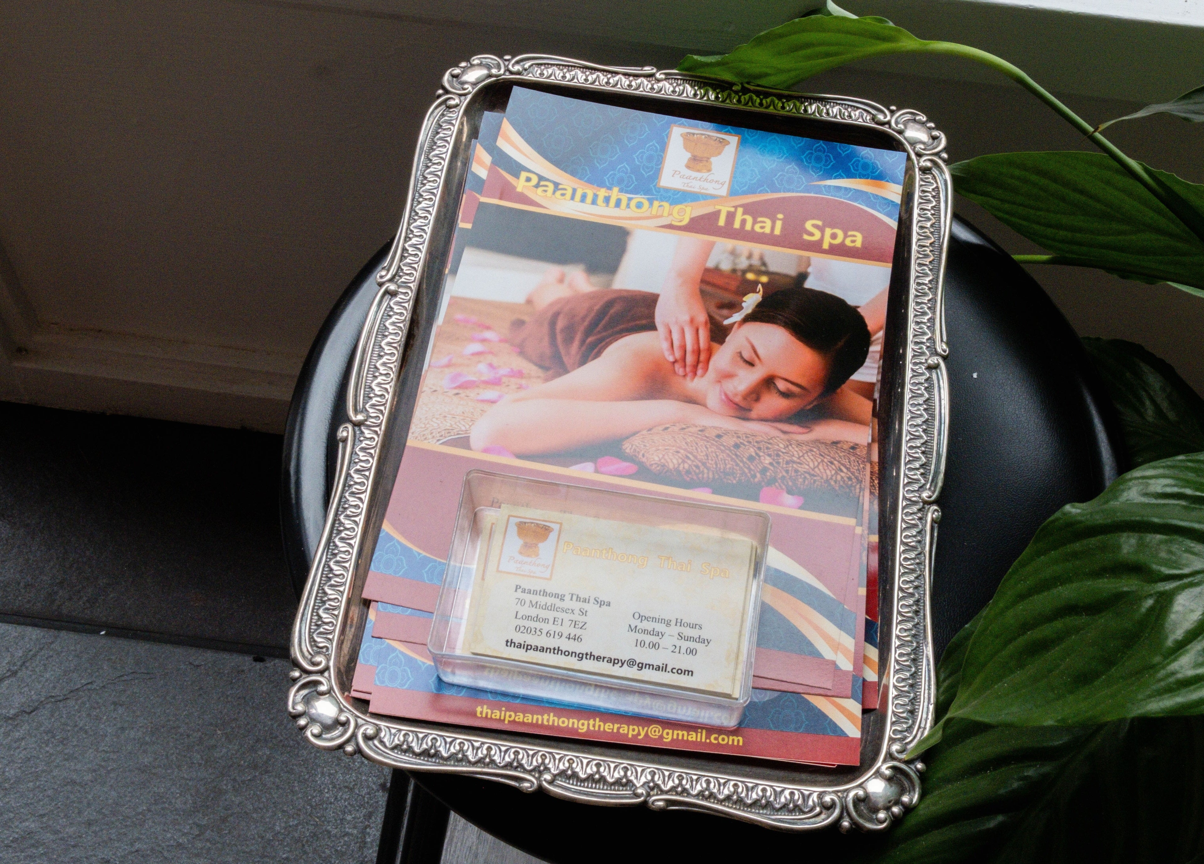 Paanthong Thai Spa flyer with massage image in ornate frame, London, England, GB.
