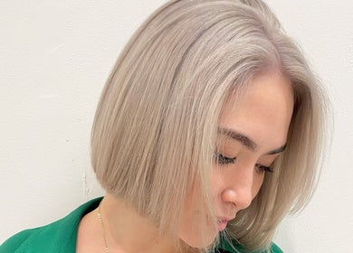 Stylish platinum bob haircut at Ciel Hair Studio by AKI, Khlong Toei, Bangkok, TH.