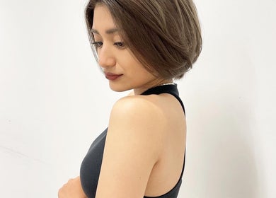 Stylish woman with short hair at Ciel Hair Studio by AKI, Khlong Toei, Bangkok, TH.