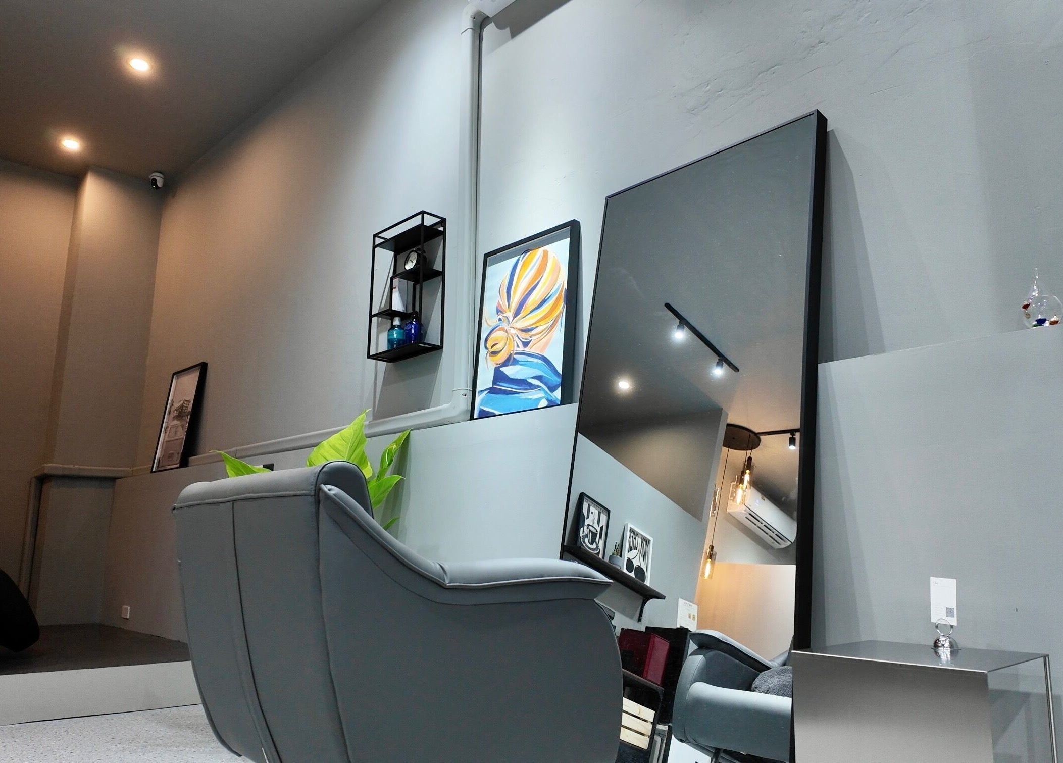 Chic interior of Ciel Japanese Hair Studio in Khlong Toei, Bangkok, TH, featuring modern decor and seating.