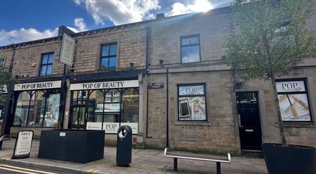 Street view of a beauty venue near Aisha Advanced Skincare, Burnley, England, GB on St James's Street.