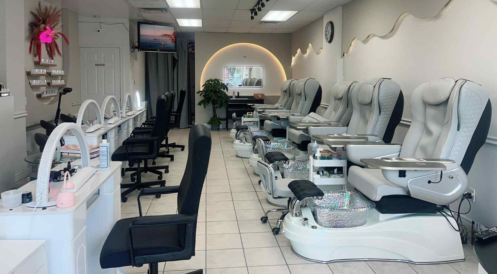 Luxurious pedicure chairs and manicure stations at Bloomie Nails and Spa in Toronto, Ontario, CA.
