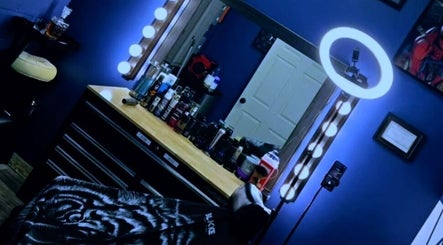 Well-equipped styling station at Quinnbarber, Tulsa, Oklahoma, US, showcasing professional grooming tools and decor.