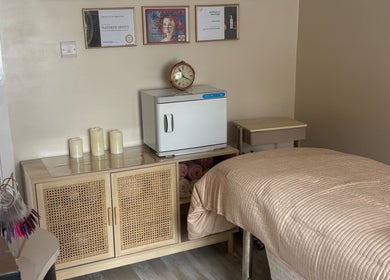 Relaxing spa room at Touch Of Beauty By Kathryn in Woodlands, England, GB featuring a cozy treatment bed and gentle lighting.