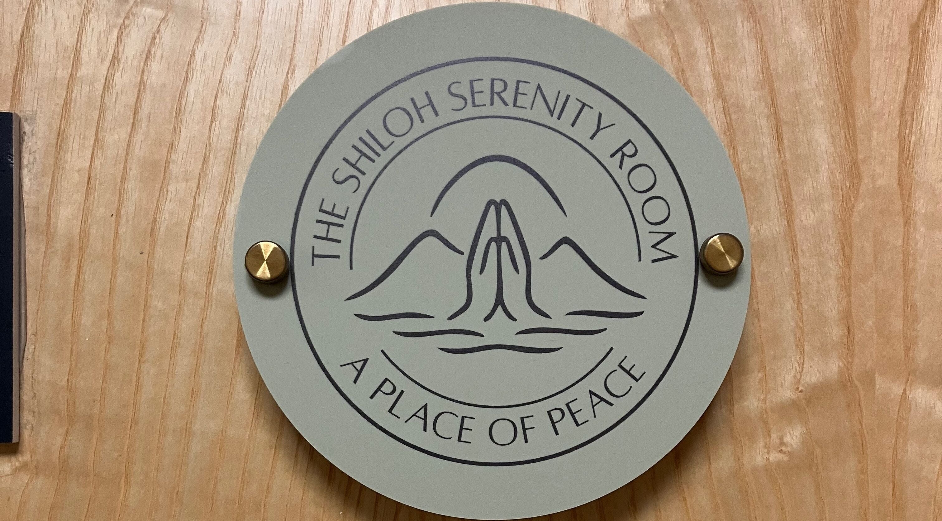 Serenity room emblem at Inner Glow by Nadia, Newport, Wales, GB symbolizes peace and tranquility.