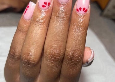 Stylish red heart nail art at Nails and Things Beauty Studio, Midrand, Gauteng, ZA.
