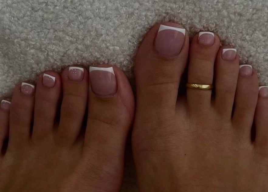 Perfectly polished toenails with a French manicure at Naileen Beauty, Midrand, Gauteng, ZA.