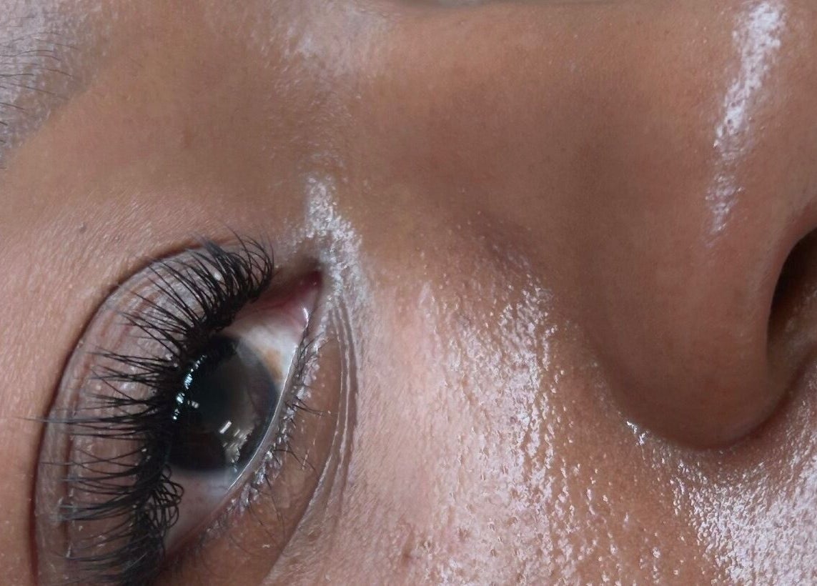 Close-up of a well-groomed eyebrow and radiant skin at Winksbymalynna, Atlanta, Georgia, US.