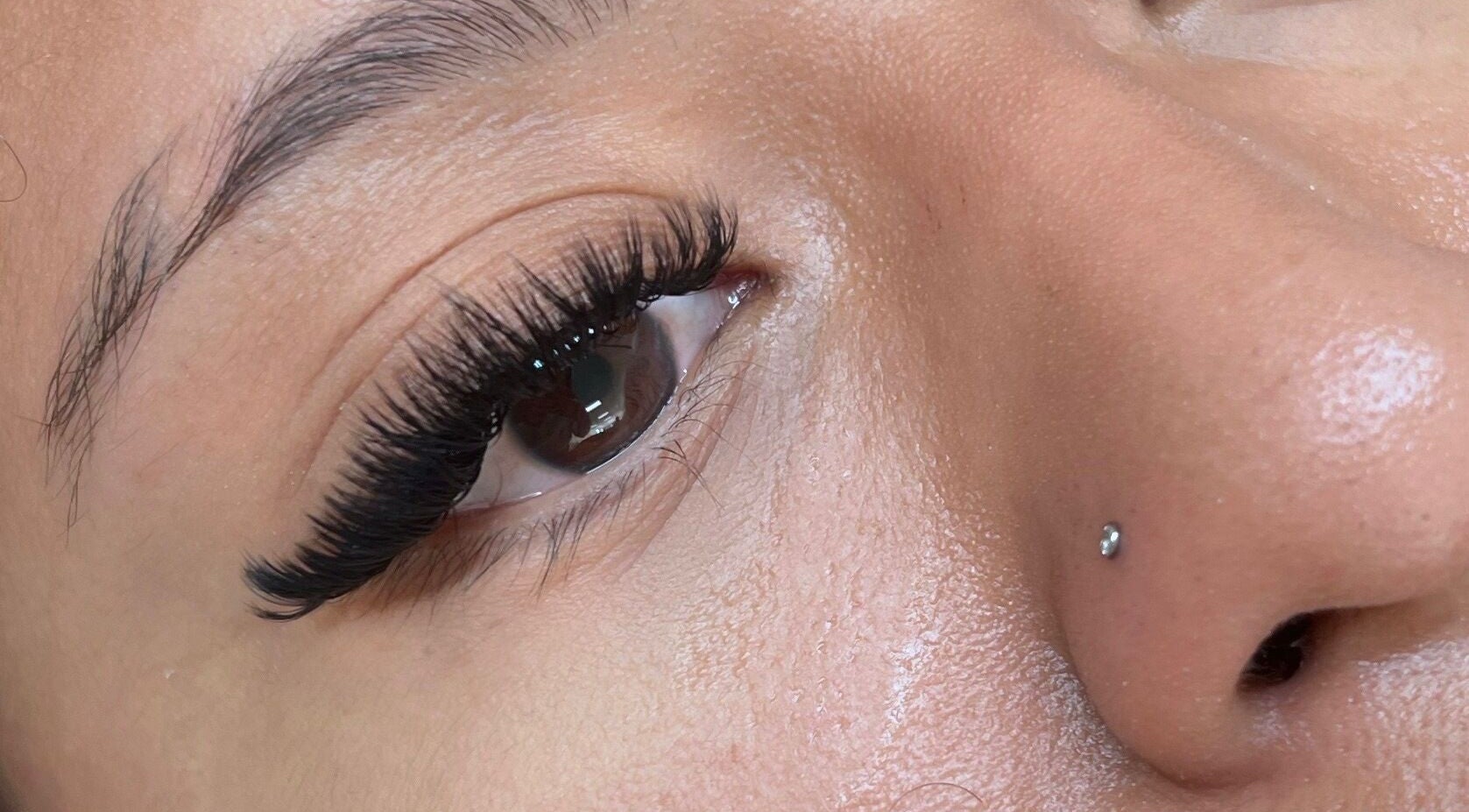 Close-up of styled eyelashes at Winksbymalynna, Atlanta, Georgia, US showcasing beautiful lash extensions.