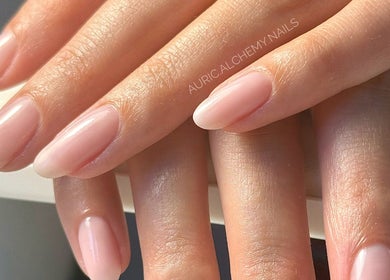 Natural pink manicure at Auric Alchemy Nails, Northampton, England, GB, showcasing elegant nail design.