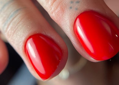Glistening red manicure at Auric Alchemy Nails, Northampton, England, GB.