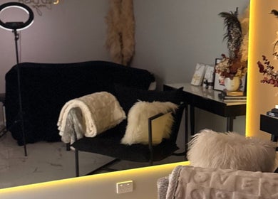 Relaxing interior of Gold Lash Lounge in Osborne Park, Western Australia, AU, featuring plush seating and chic decor.