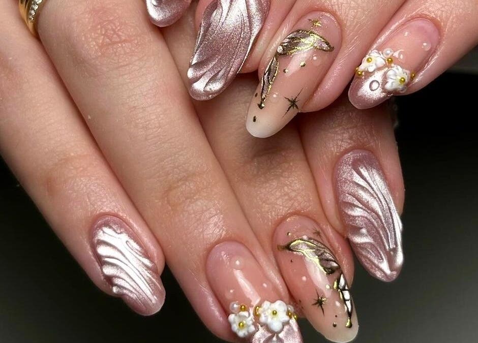 Intricate nail art design at laDiri Nails, București, București, RO. Features shimmering pink and gold accents.