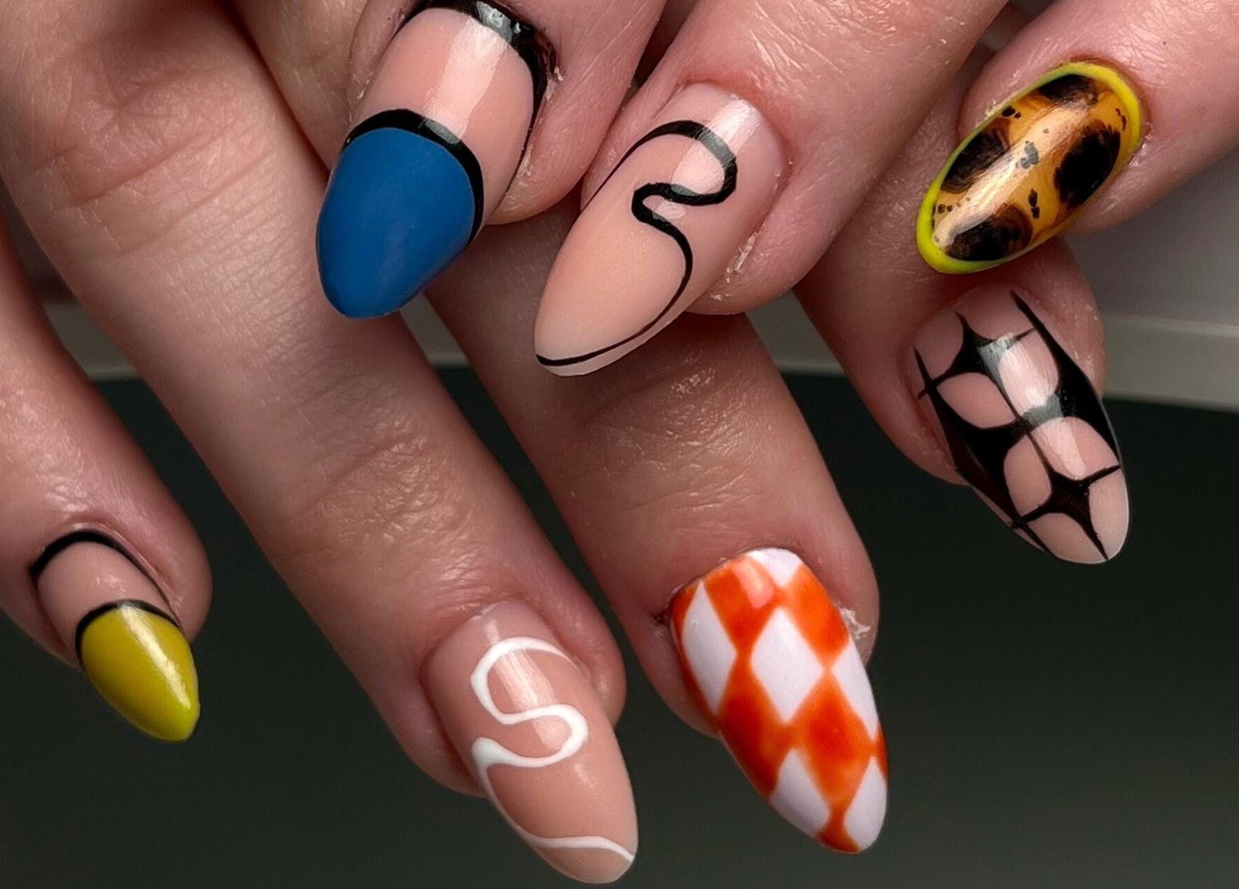 Creative nail art at laDiri Nails, București, București, RO showcasing vibrant, unique patterns.