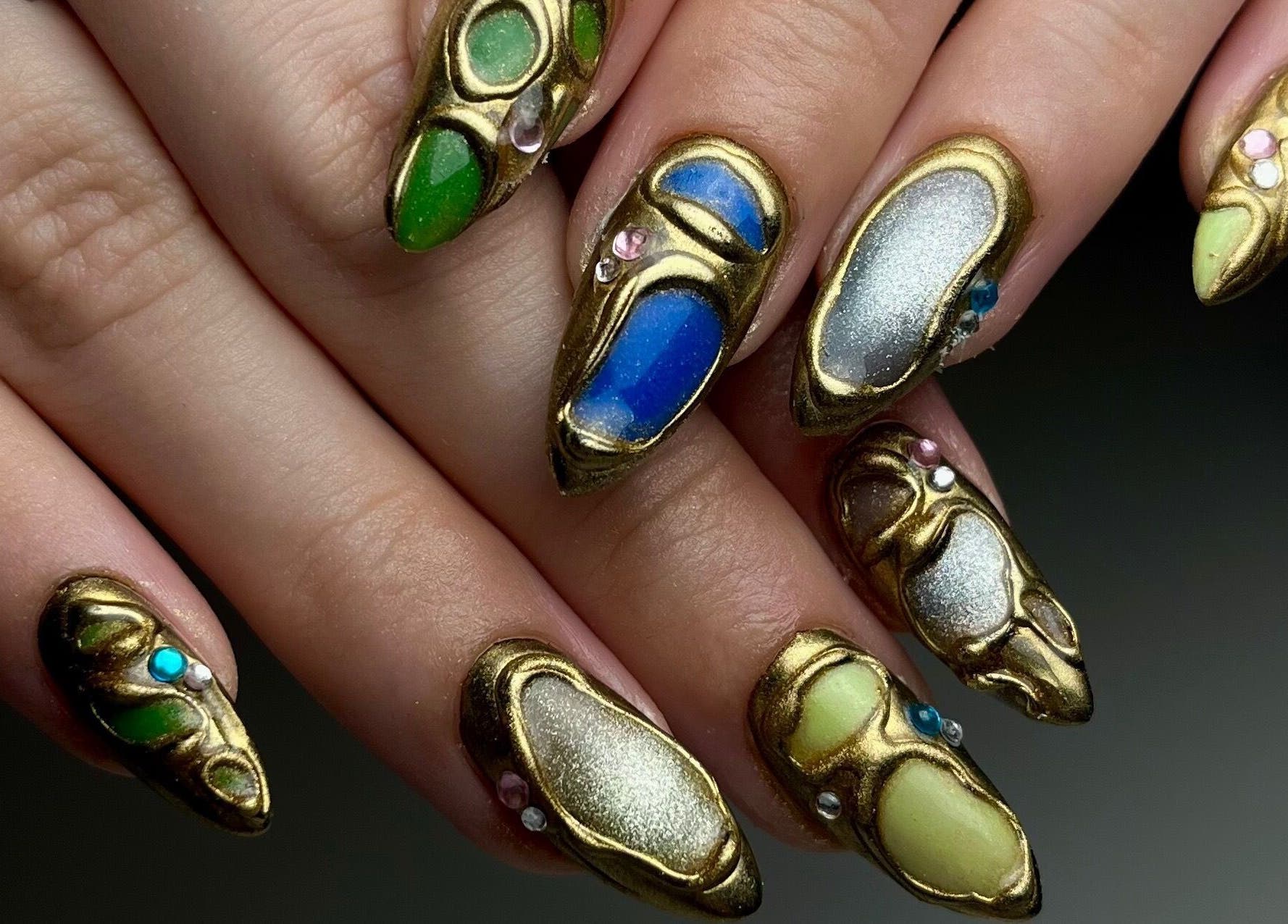 Luxury nail art with jewel-tones at laDiri Nails, București, București, RO. Vibrant and creative manicure.