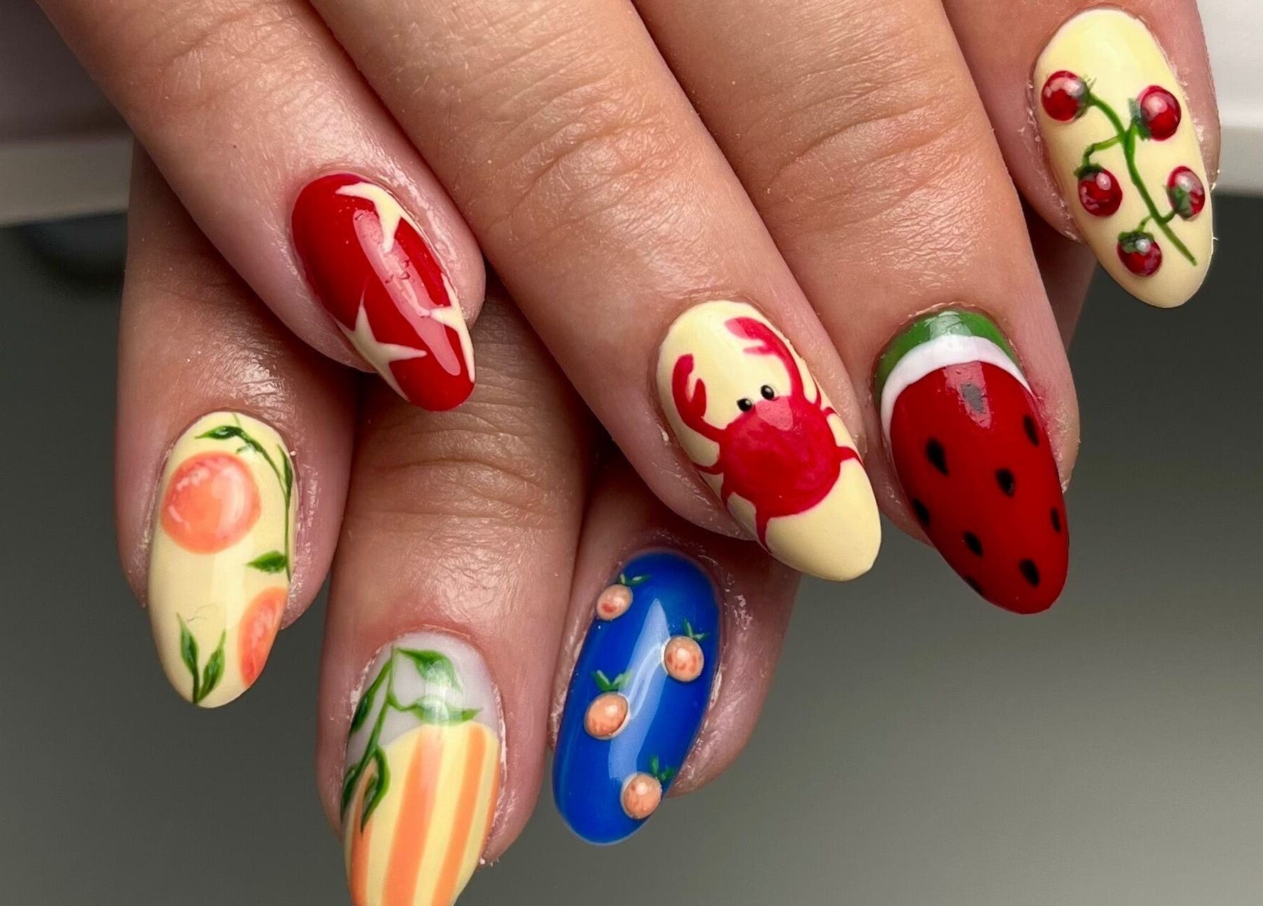 Vibrant fruit nail art at laDiri Nails, București, București, RO, showcasing creative and colorful designs.