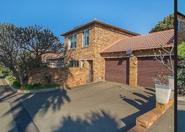 Exterior view of Rocky Pinnacle in Randburg, Gauteng, ZA with brick facade and landscaped surroundings.