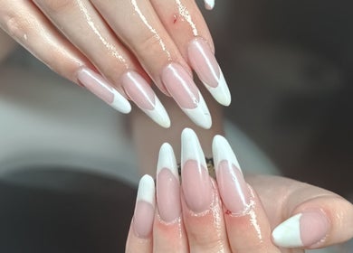 Beautiful French manicure at The Braless Nail Artist in Crestmead, Queensland, AU, featuring glossy, long nails.