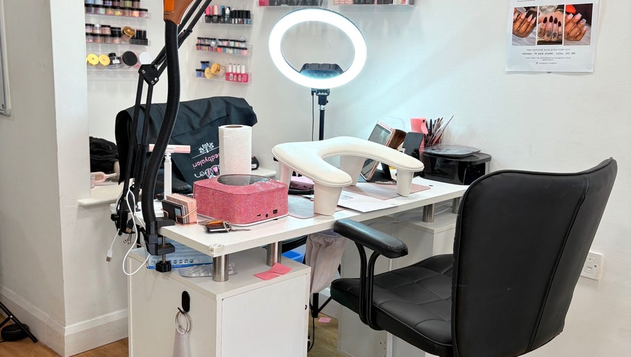 Stylish nail station at Nailed by Alori in Luton, England, GB, with manicure tools and lighting.
