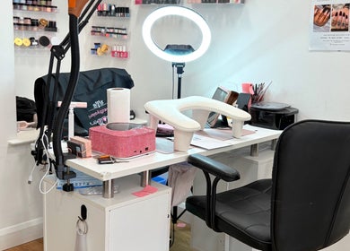 Stylish nail station at Nailed by Alori in Luton, England, GB, with manicure tools and lighting.