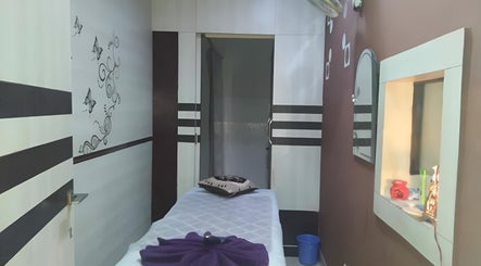 Relaxing massage room at Heaven in Dream Spa and Salon, Jaipur, Rajasthan, IN with soothing decor.