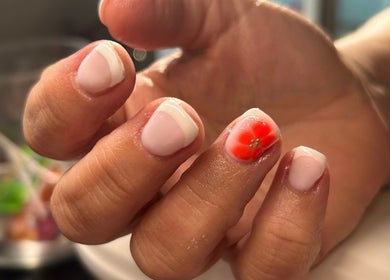 Elegant floral nail art at Beautbynatz, Bathgate, Scotland, GB, showcasing intricate design details.