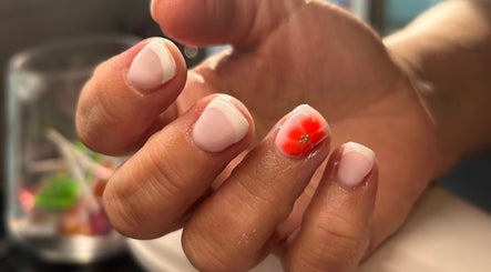 Elegant floral nail art at Beautbynatz, Bathgate, Scotland, GB, showcasing intricate design details.