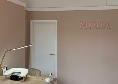 Minimalist beauty workspace at Moda, Edinburgh, Scotland, GB with elegant decor and stylish lighting.