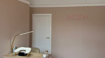 Minimalist beauty workspace at Moda, Edinburgh, Scotland, GB with elegant decor and stylish lighting.