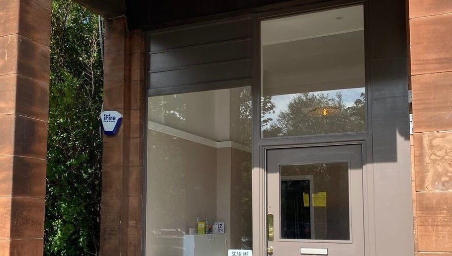 Entrance of Moda beauty venue, showcasing wooden details in Edinburgh, Scotland, GB.