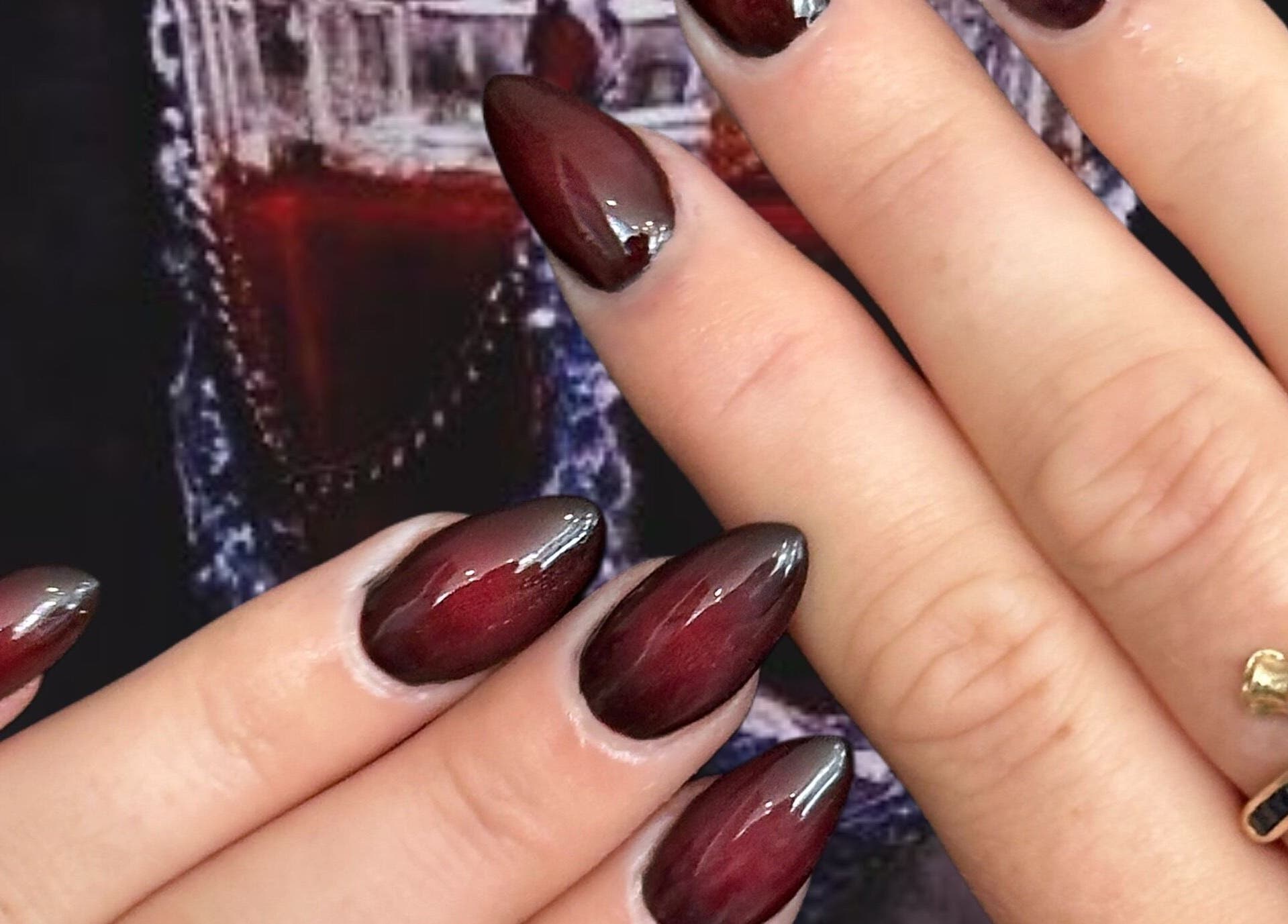 Elegant dark red nails by Your local nail lady in Warners Bay, New South Wales, AU, showcasing glossy manicure.