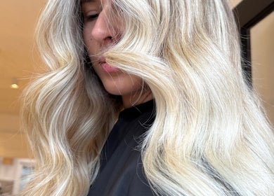 Stylish blonde waves at Sinead Murphy Hair in Cottesloe, Western Australia, AU.
