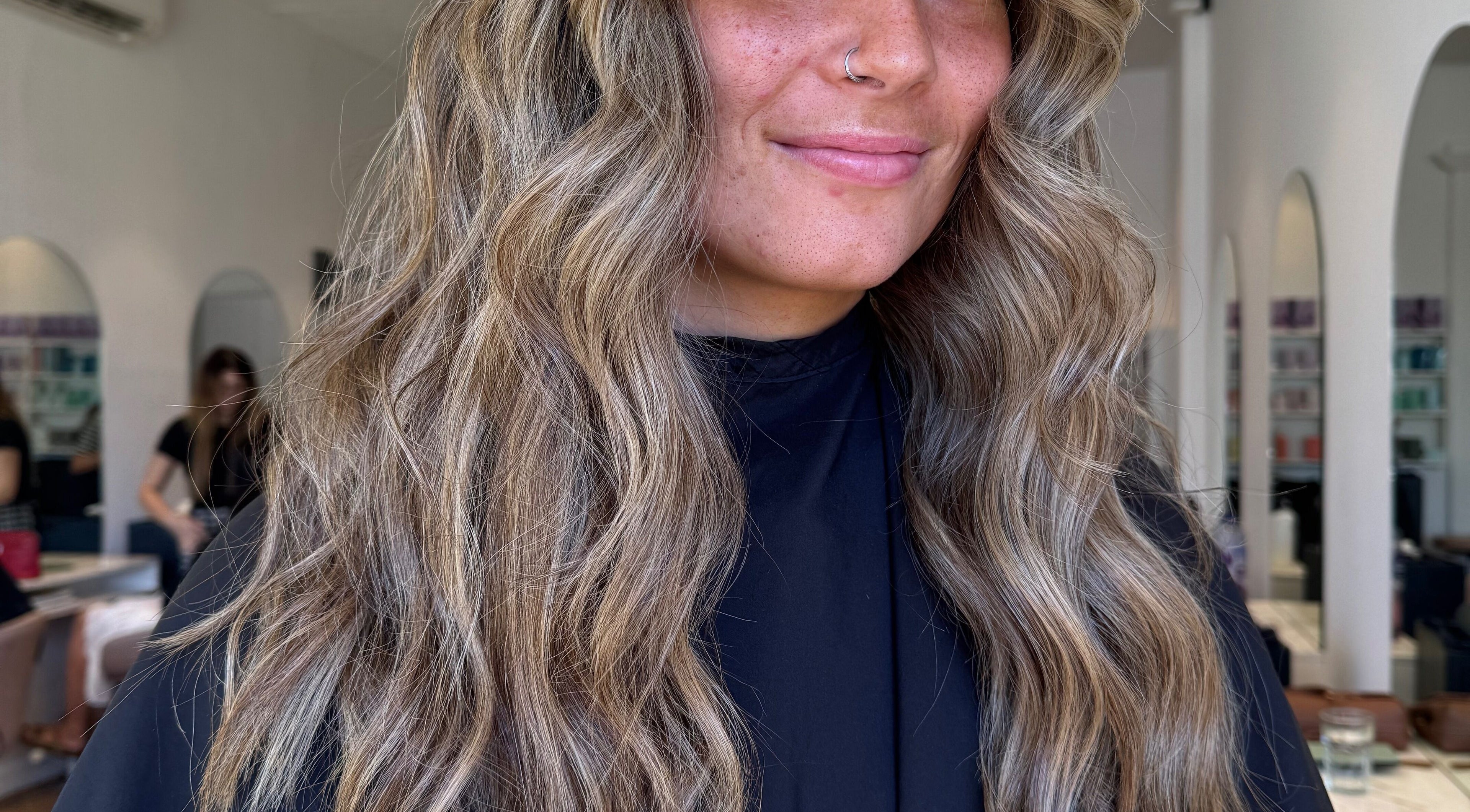 Elegant wavy hairstyle at Sinead Murphy Hair, Cottesloe, Western Australia, AU salon.