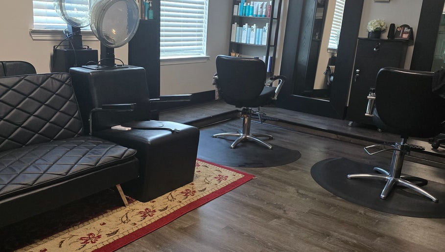 Modern salon chairs and styling stations at Dreamcuts and Styles in Fulshear, Texas, US.