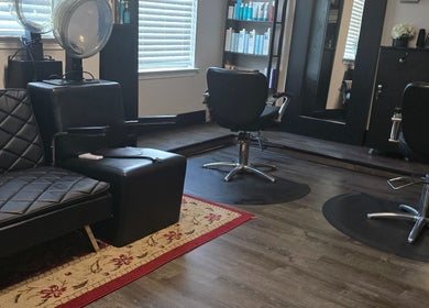 Modern salon chairs and styling stations at Dreamcuts and Styles in Fulshear, Texas, US.