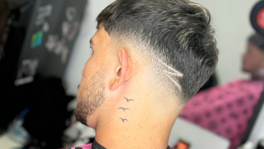 Detailed side view of a trendy haircut at Kalfon Barbershop, ראשון לציון, מחוז המרכז, IL.
