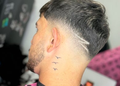 Detailed side view of a trendy haircut at Kalfon Barbershop, ראשון לציון, מחוז המרכז, IL.
