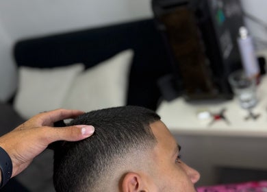 Professional haircut at Kalfon barbershop, ראשון לציון, מחוז המרכז, IL showcasing a precise fade.