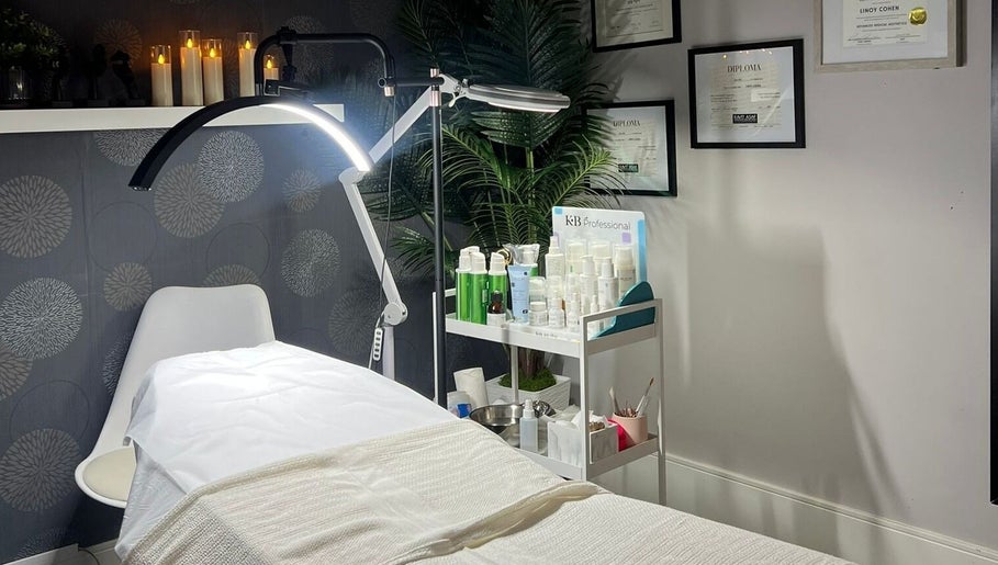 Cozy treatment room at Lini's Cosmetics, Vaughan, Ontario, CA, featuring modern equipment and soothing decor.
