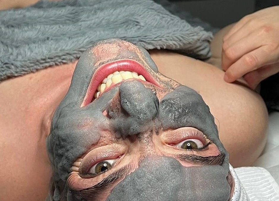 Client enjoying a clay facial mask at Lini's Cosmetics, Vaughan, Ontario, CA.