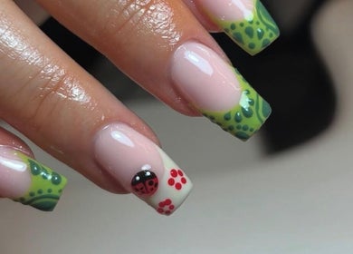 Elegant green and ladybug nail art at RB BEAUTY THERAPY, Glasgow, Scotland, GB.