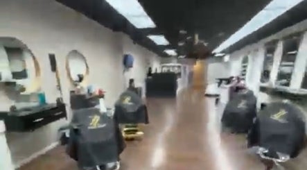 Spacious and elegant interior of Amy Garche Beauty in Linden, New Jersey, US with stylish salon chairs.