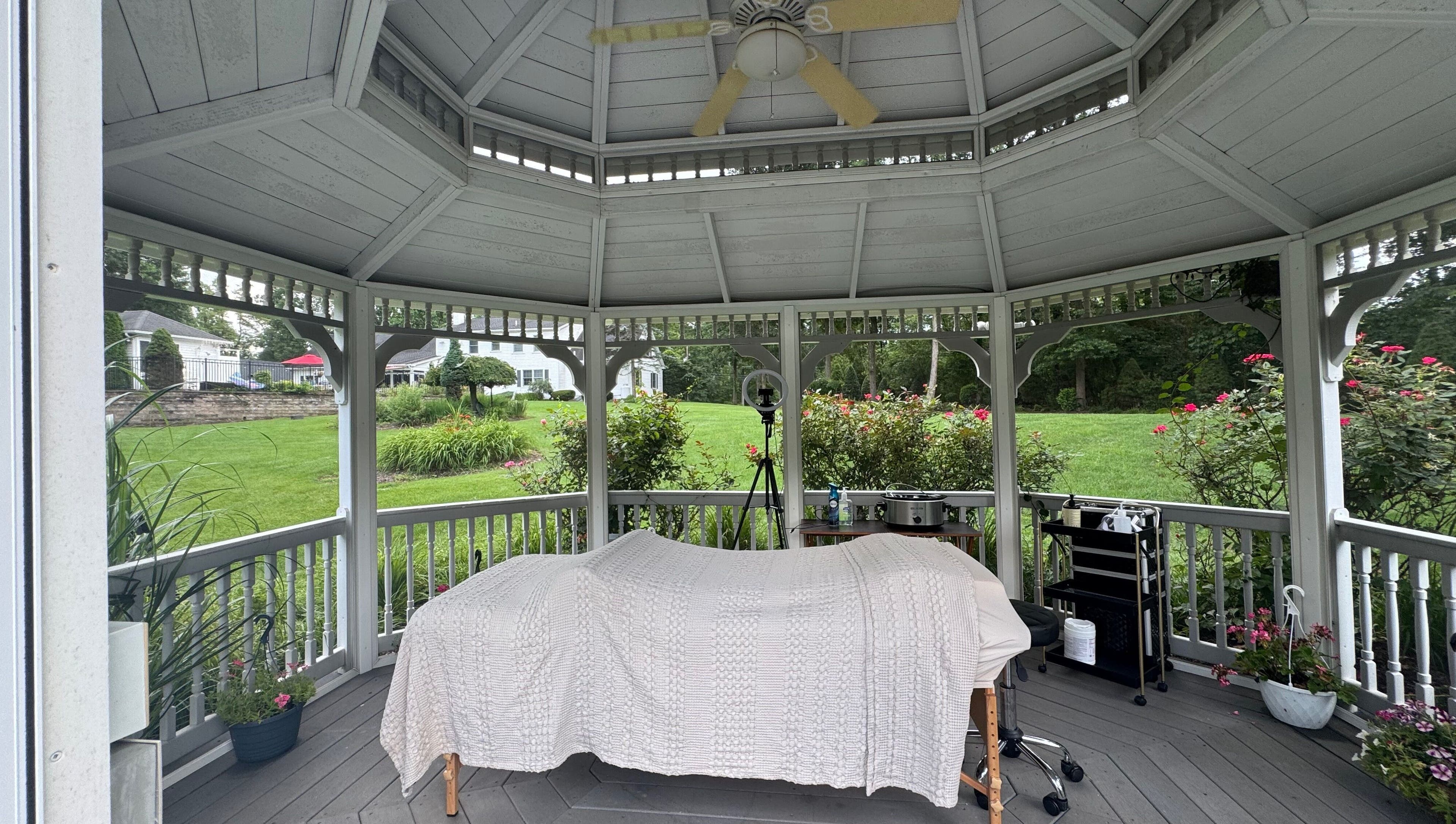 Relaxing spa setup in a gazebo at Aesthetically_Azaria, Green Lane, Pennsylvania, US.