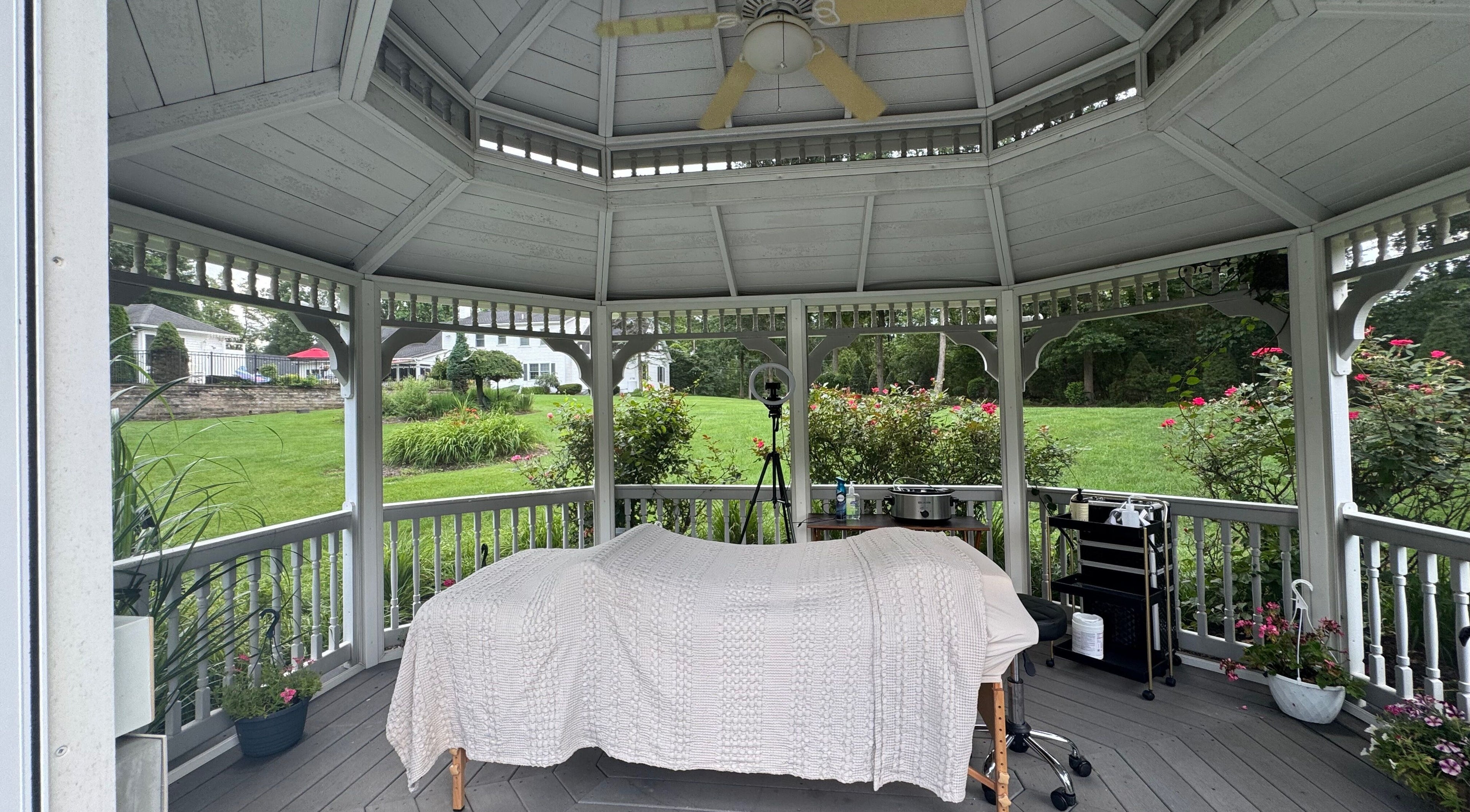 Relaxing spa setup in a gazebo at Aesthetically_Azaria, Green Lane, Pennsylvania, US.