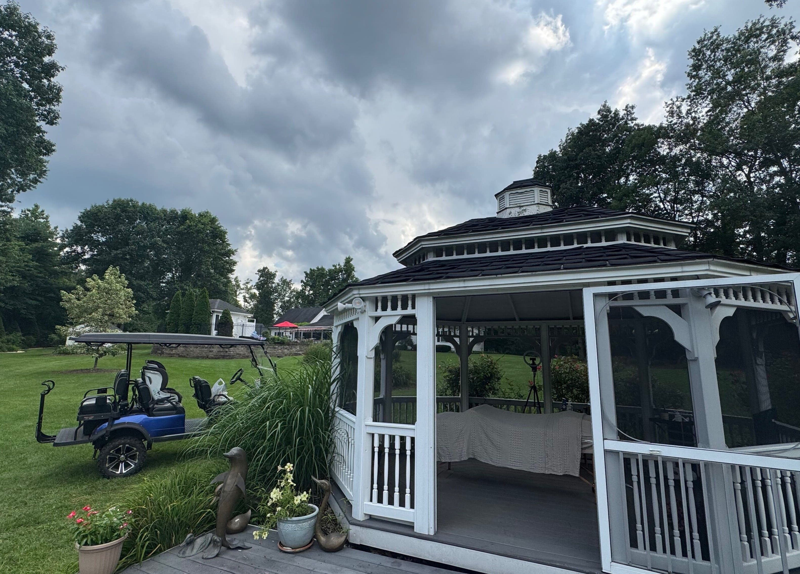 Serene gazebo at Aesthetically_Azaria, Green Lane, Pennsylvania, US, amid lush greenery.